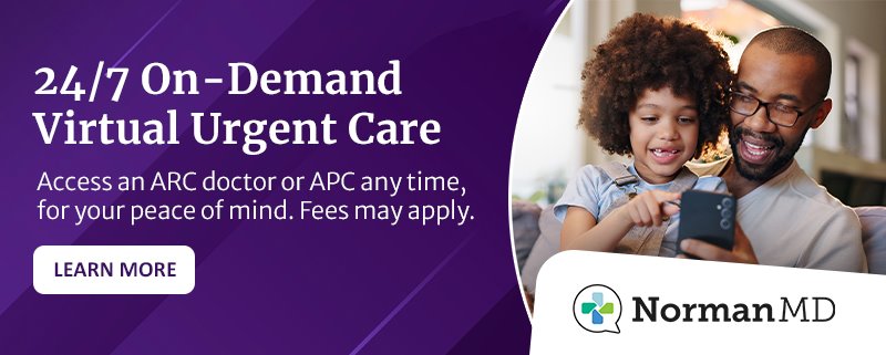 NormanMD ad with the words '24/7 On-Demand Virtual Urgent Care,' 'Access an ARC doctor or APC any time, for your peace of mind. Fees may apply,' 'Learn More' and an image of a father and daughter using the NormanMD mobile app while on the couch at home
