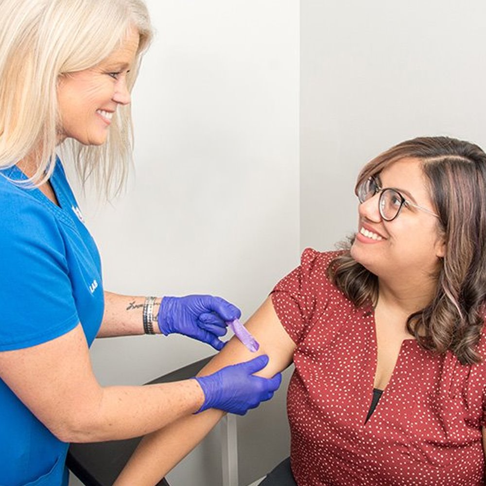 ARC patient receiving her flu shot in a clinic setting