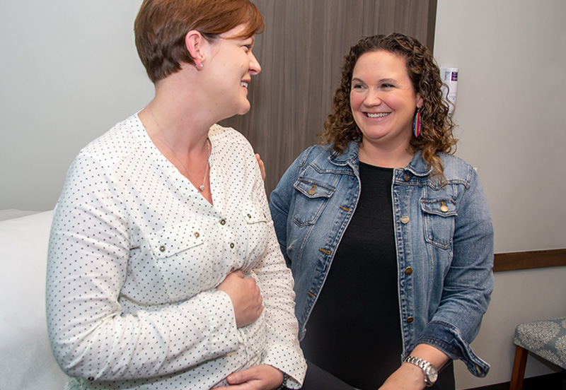 Dr. Andrea Campaigne seeing an Ob/Gyn patient
