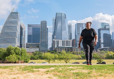 ARC patient enjoying a walk at the park in Austin