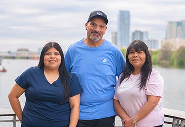 ARC patient enjoying the view off a dock at Lady Bird Lake in Austin