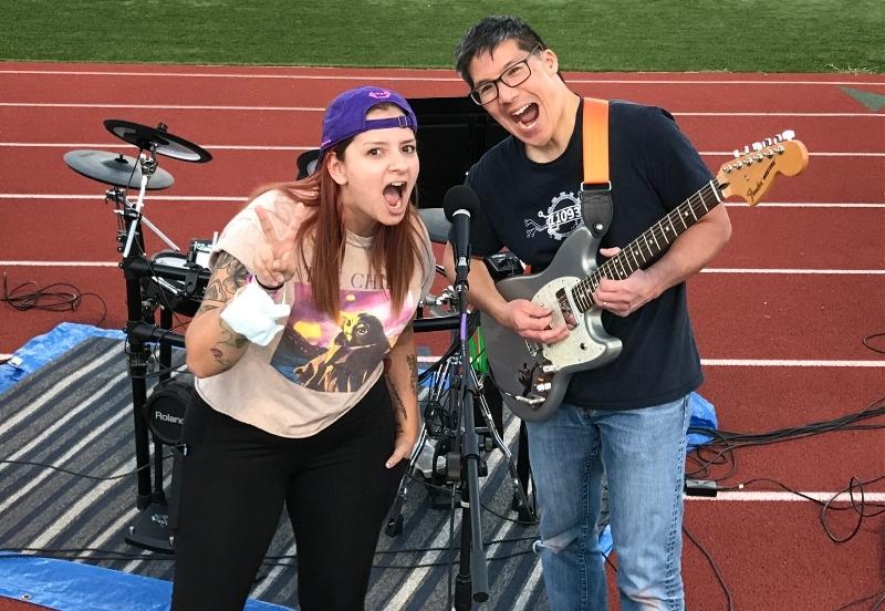 Doctor Arthur Cheng and Nurse Taylor at a football game