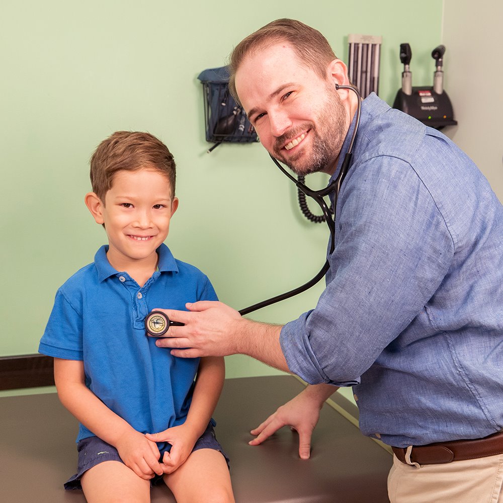 Pediatric age ARC patient being examined using a stethoscope during an After Hours Clinic appointment