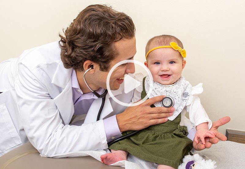 Doctor seeing a baby for a sleep appointment