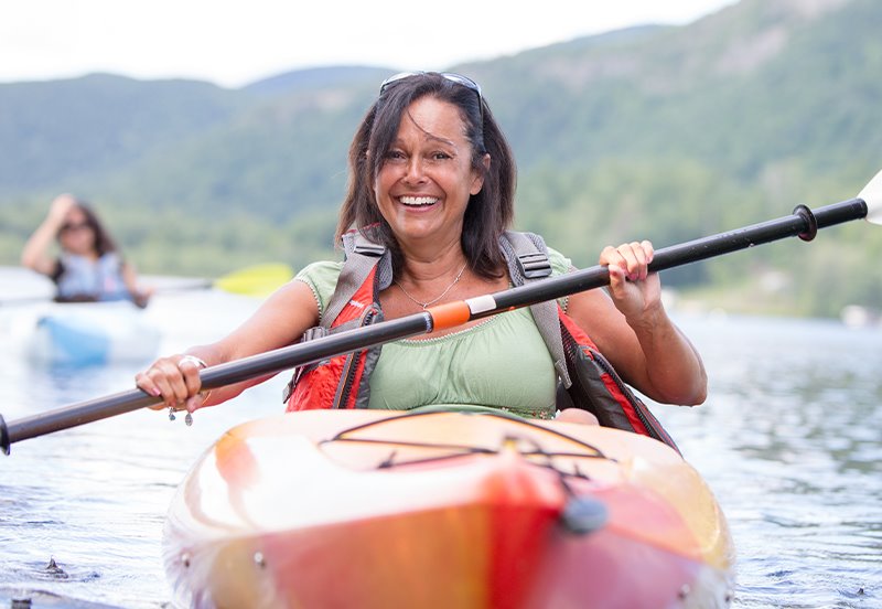 Woman enjoying a day out while canoeing in Austin