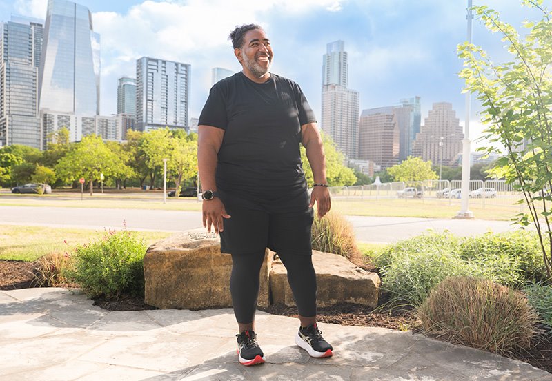 Happy ARC patient enjoying a beautiful day out in the park in Austin, representing an active lifestyle after bariatric surgery